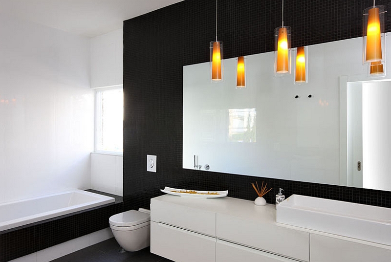 Modern minimalist bathroom in black and white with brilliant lighting