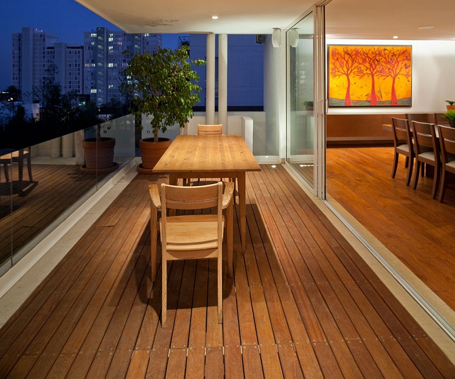 Outdoor wooden deck with small seating space