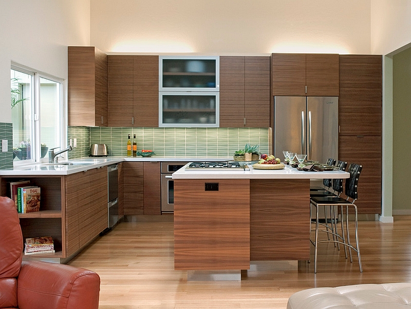 Pattern of the backsplash tiles seem to complement the wooden cabinets perfectly