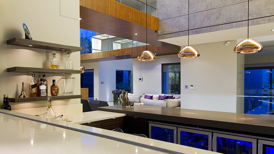 Pendant lights in copper hue above the kitchen counter