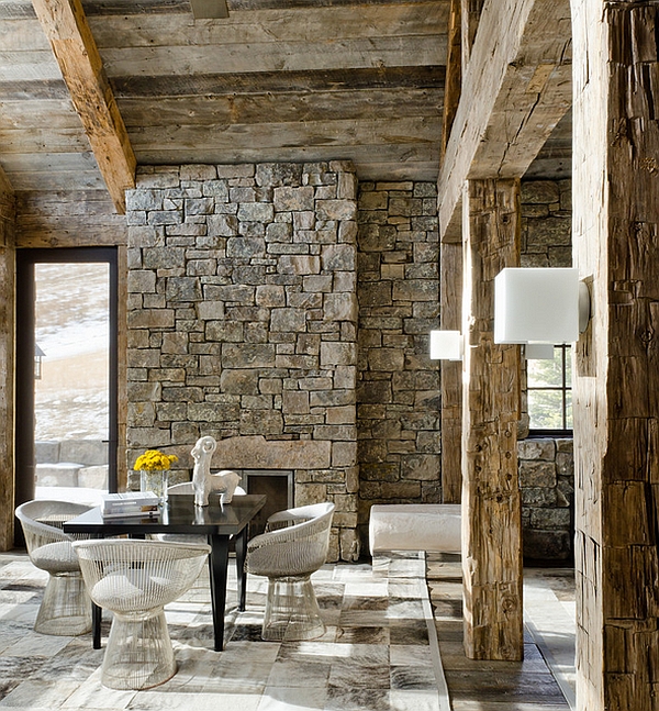 Platner arm chairs used as dining room chairs in this rustic home