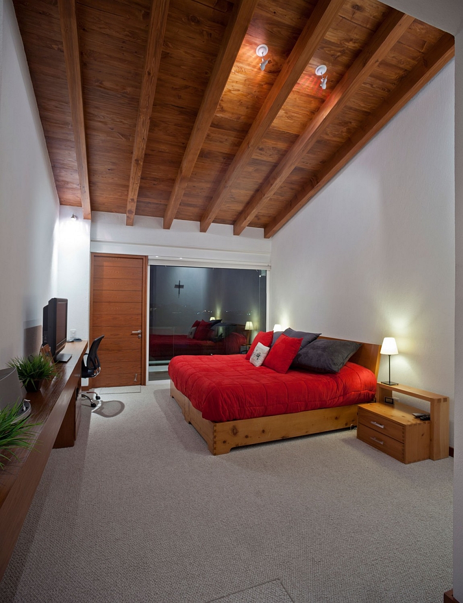 Plush bedroom in white with red bedding