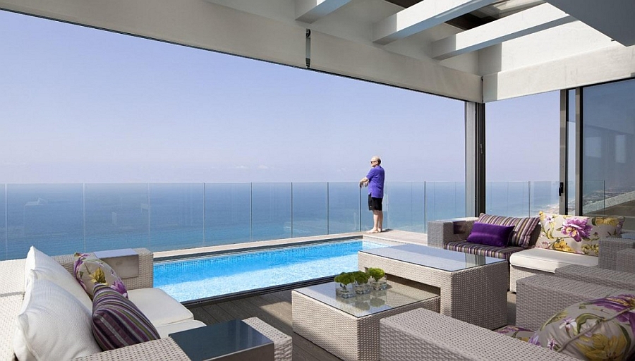 Poolside terrace offers breathtaking views of the Mediterranean Sea