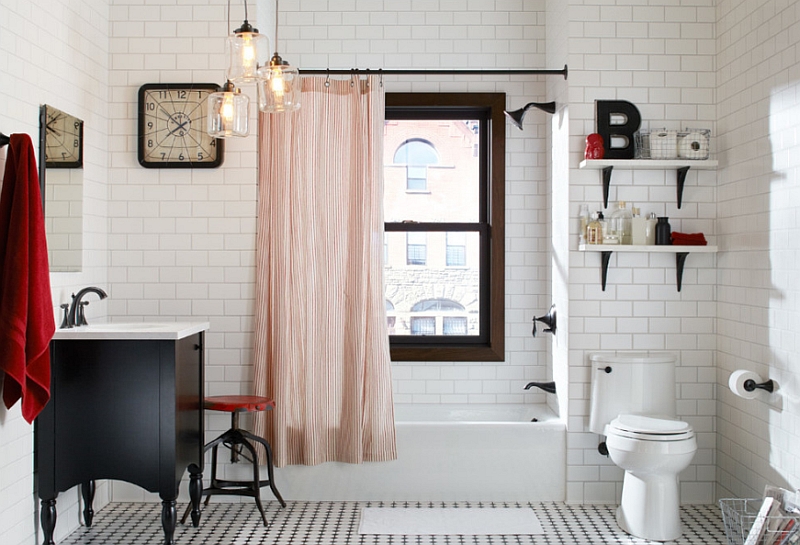 Pops of red in the beautiful black and white bathroom