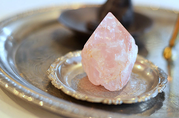 Rose quartz on a thrifted coaster