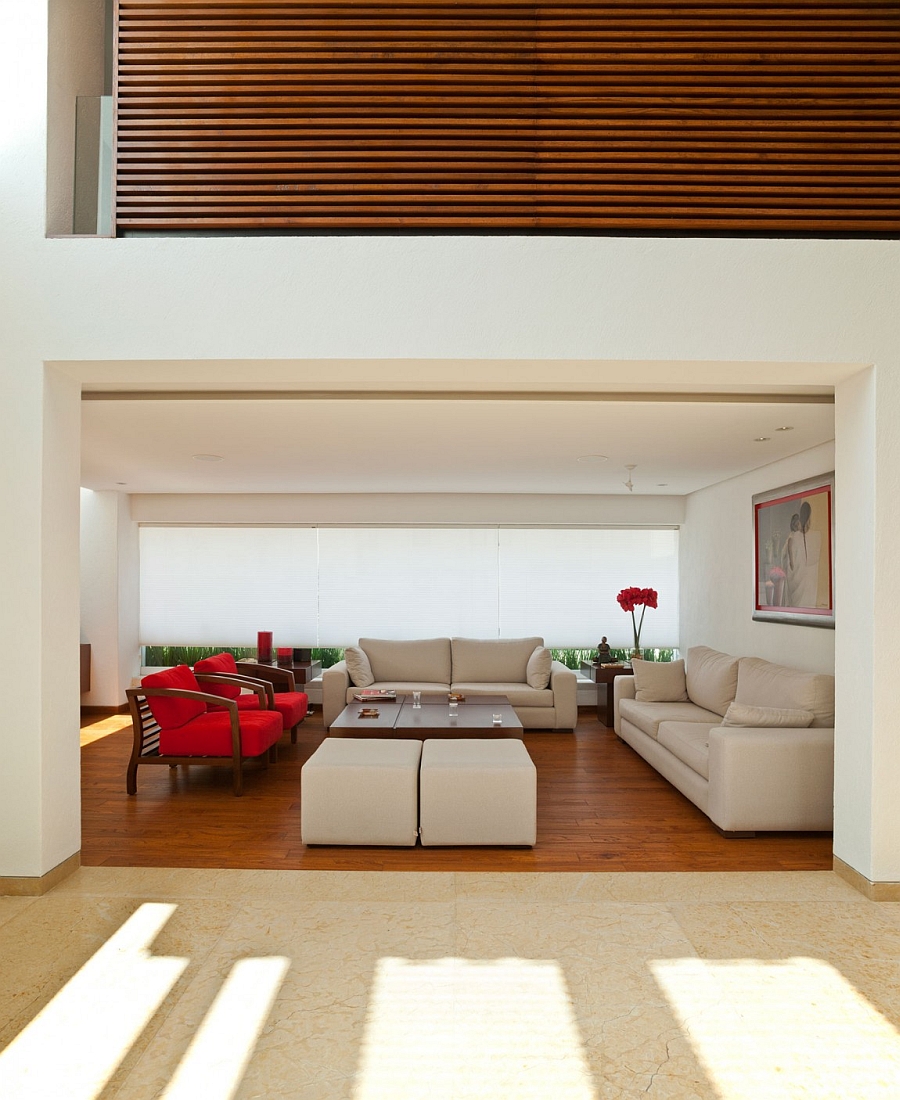 Seating area with bright red accent chairs