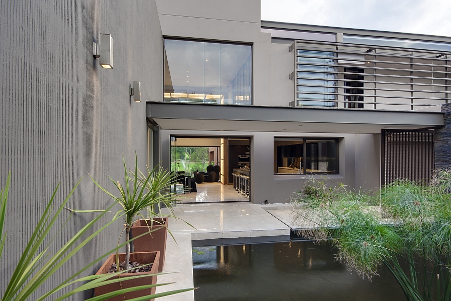 Serene koi pond with walkway next to it