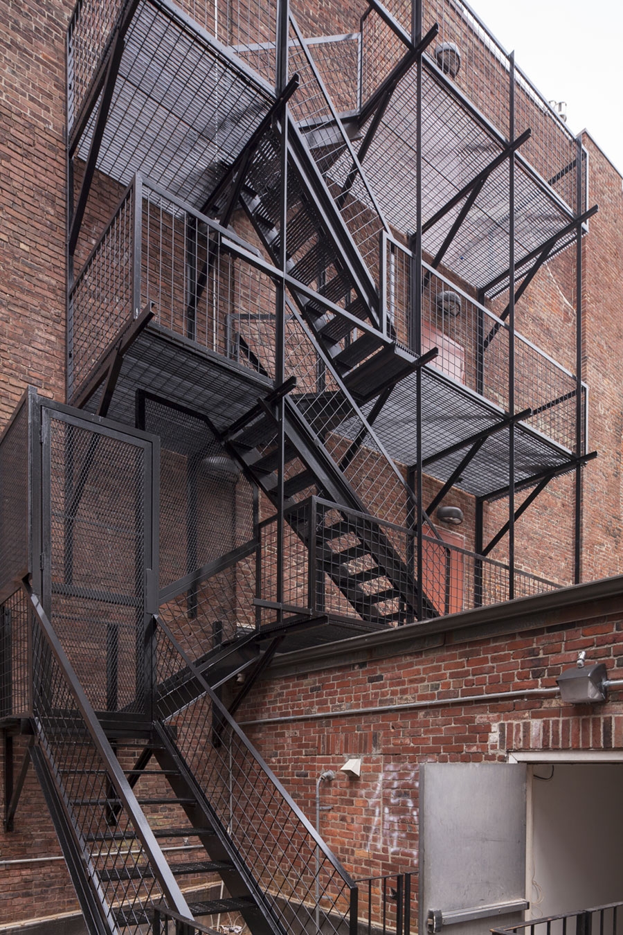 Steel staircase leading to the entrance