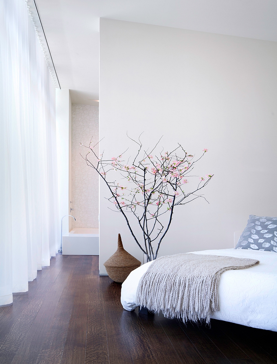 Stylish and cozy bedroom in white