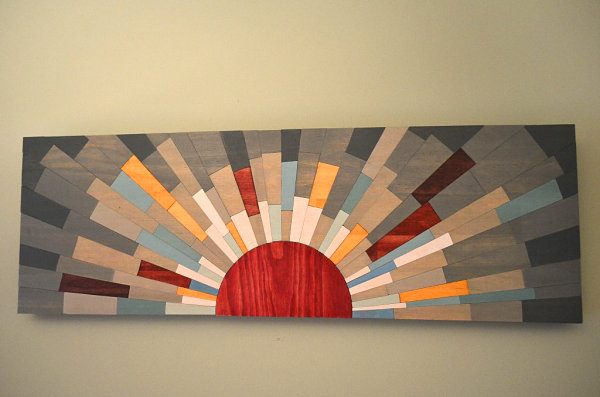 Sun-themed wall art from Etsy shop Stains and Grains