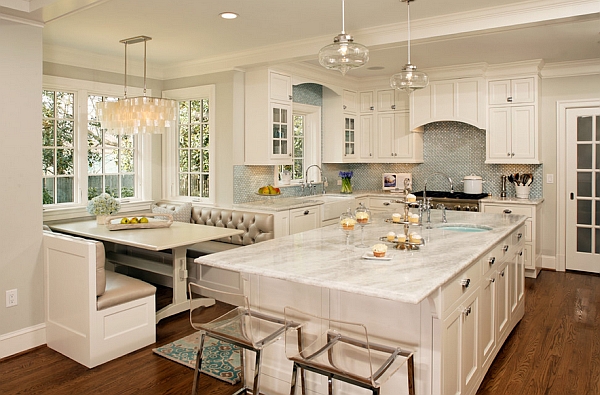 The banquette plays into the charm of the timeless, dreamy white kitchen