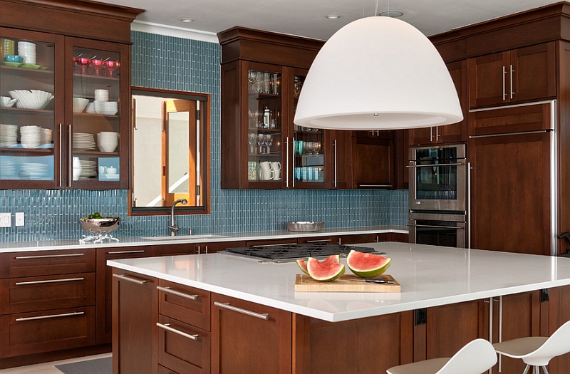 The blue backsplash can be paired with a wide range of colors