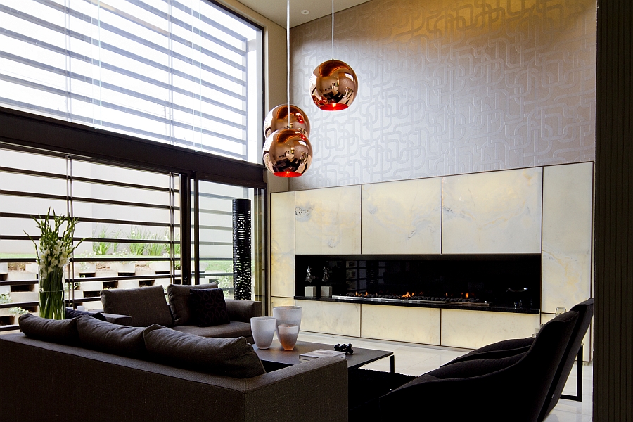 Tom Dixon pendant lights in the stunning living room