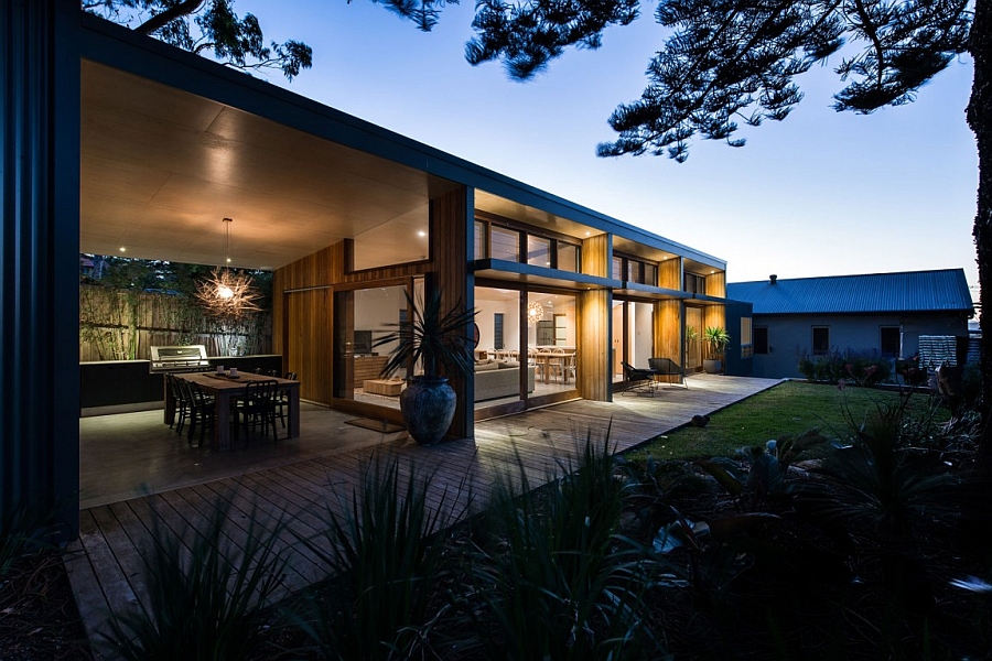 Warm lighting enlivens the house at dusk