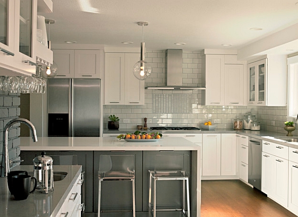 Waterfall caesarstone countertop complements the wooden flooring perfectly