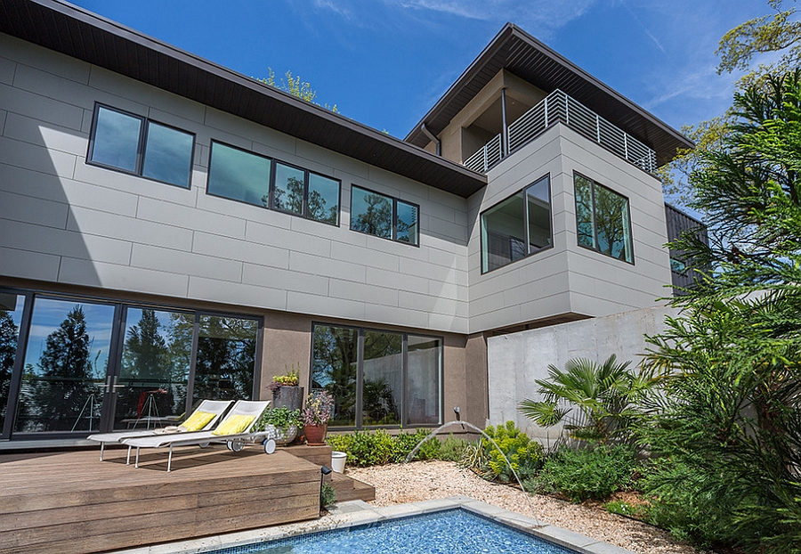 Wooden deck next to the pool