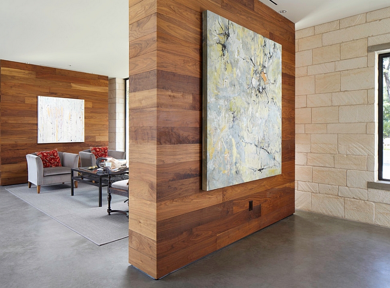 Wooden wall panels add warmth to the room