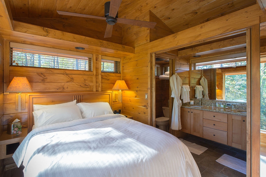 Woodsy bedroom of the small prefab house