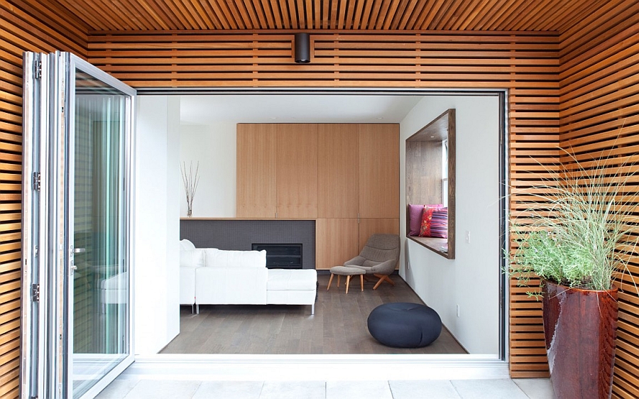 Access to the deck from the living area using glass doors