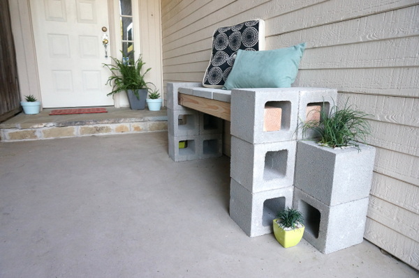 Add pillows to the cinder block bench to soften the look