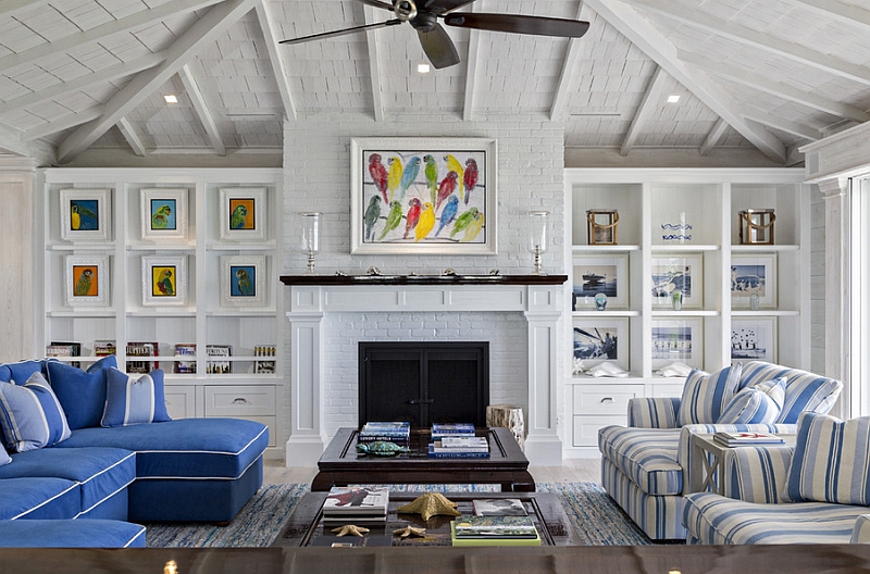 Beach style living room with multi-colored wall art