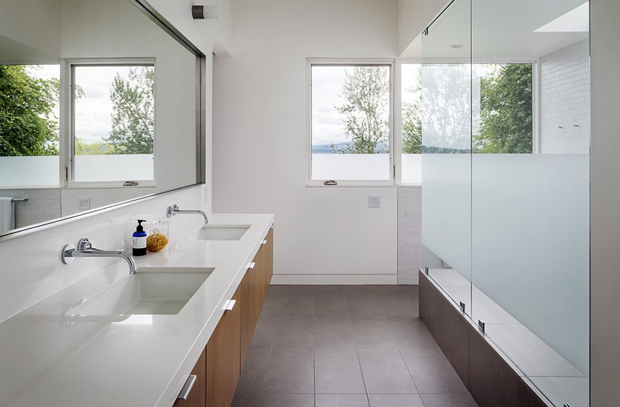 Beautiful bathroom in white with wooden floating vanity