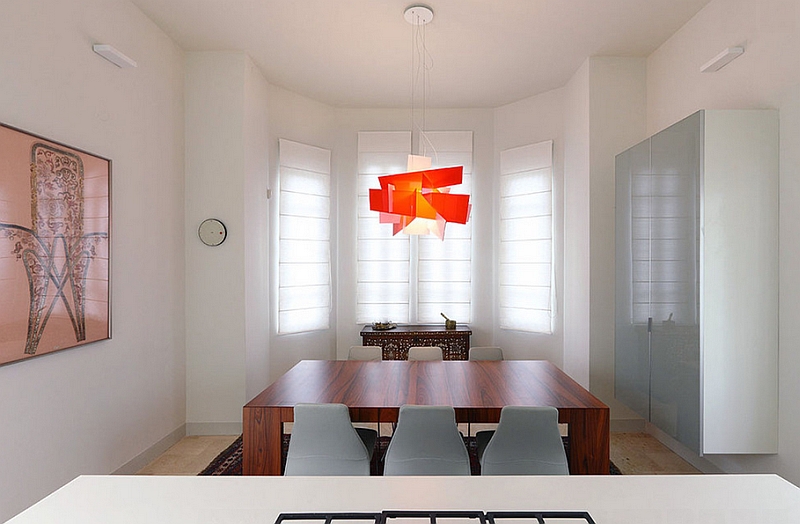 Big Bang Suspension lamp adds color to the fabulous dining room