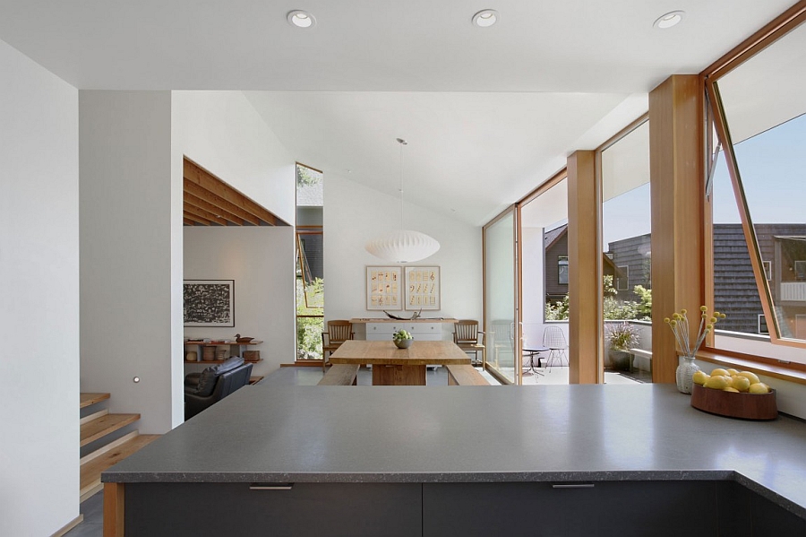 Breezy dining and kitchen areas connected with the terrace outside