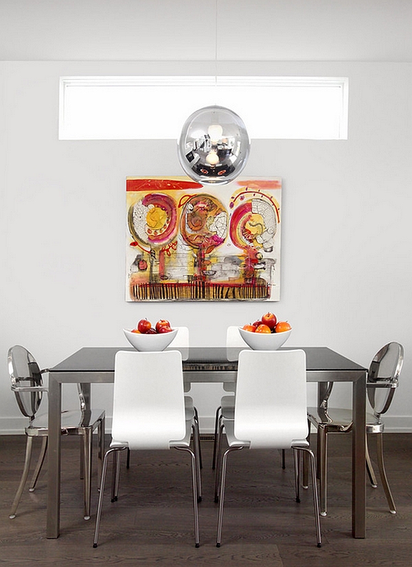 Bright metallic accents in the minimalist dining room