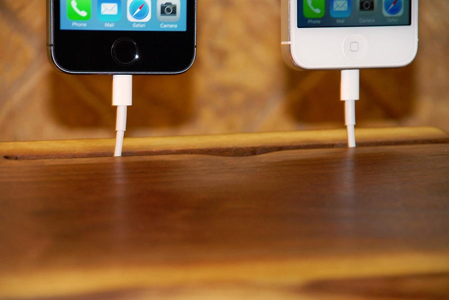 Charge your smartphones at the stylish wooden dock