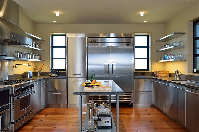 Contemporary kitchen with shiny stainless steel surfaces