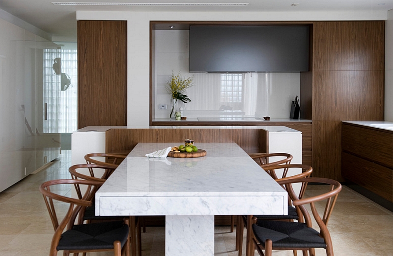 Cool Wishbone chairs coupled with a simple, marble top dining table