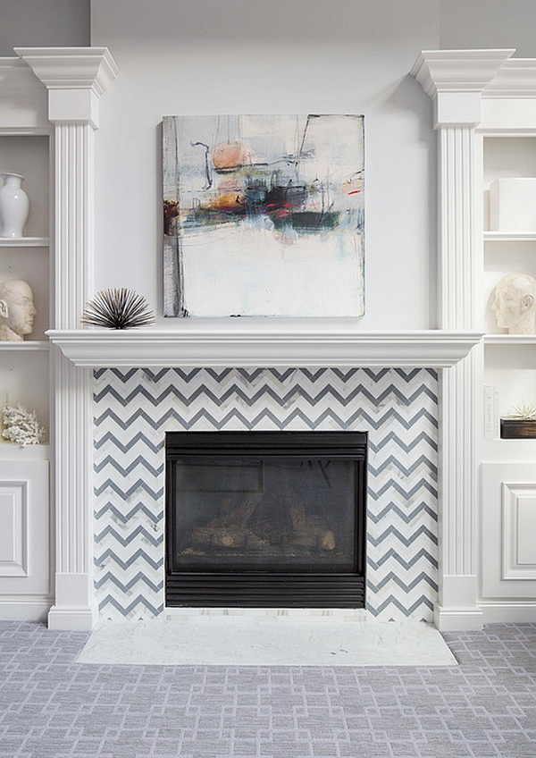 Custom designed tile around the fireplace showcases chevron pattern in a classy fashion