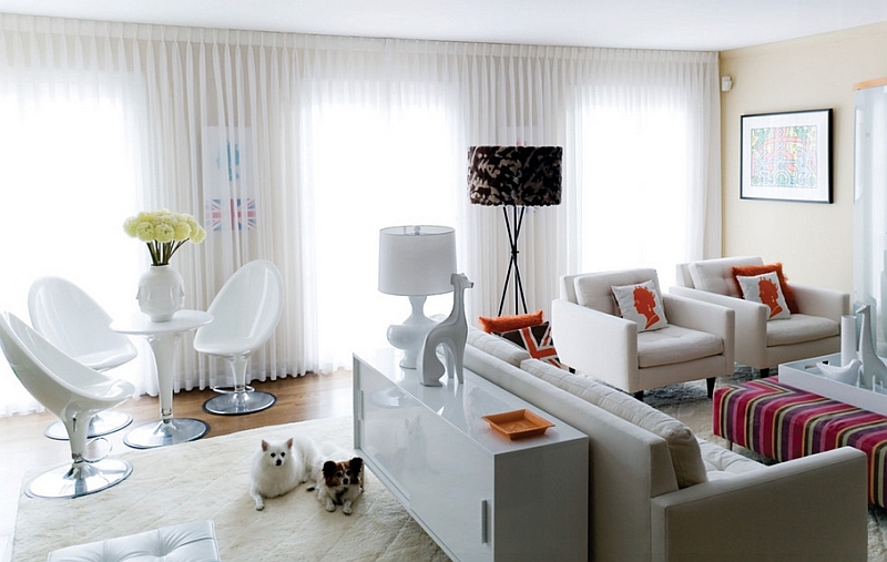 Dark floor lamp makes a bold statement when placed in a white contemporary living room