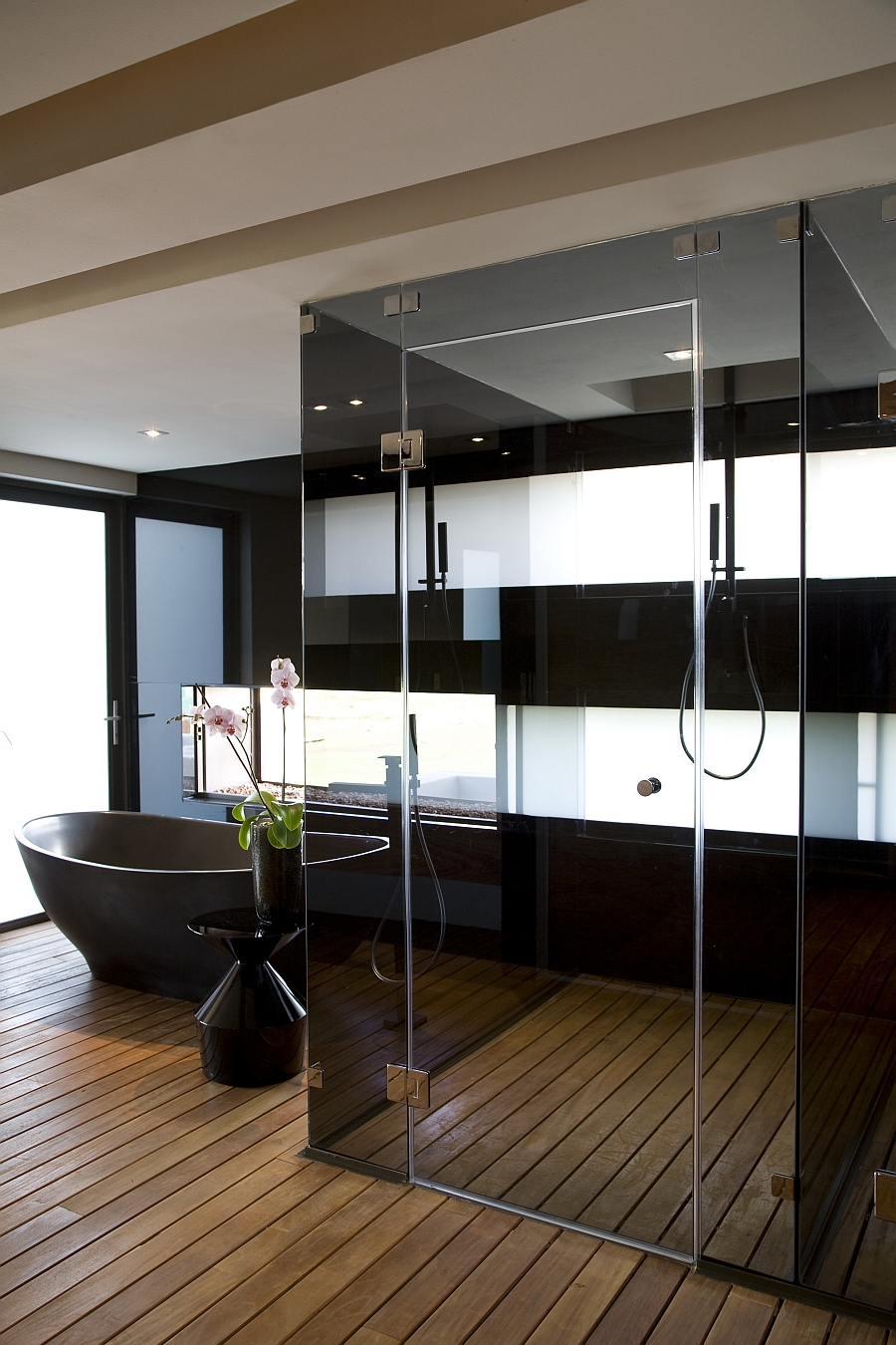 Exqusite bathroom with glass shower area