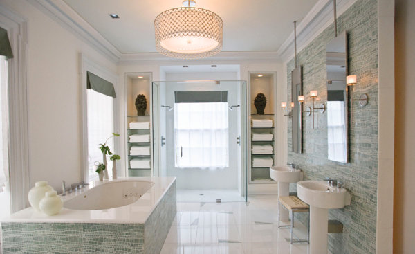 Glass shelving helps create symmetry in a bright powder room