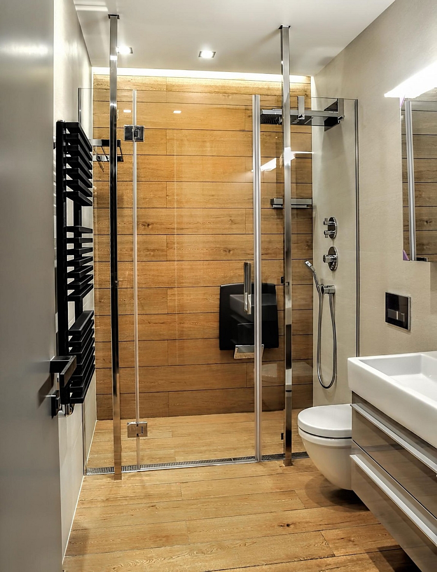 Glass shower enclosure laced in wood