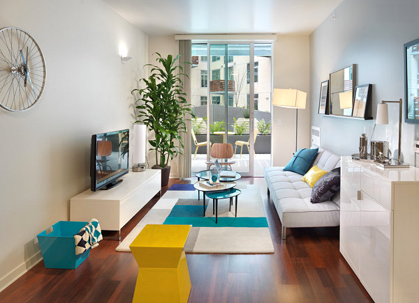 Glossy white media console in a modern living room