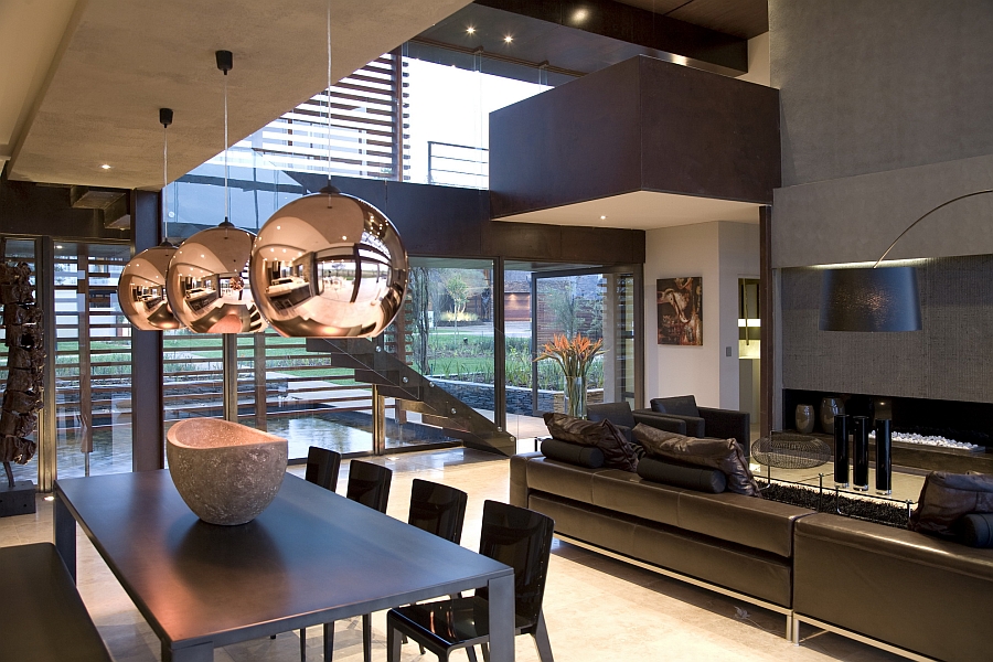 Gorgeous copper pendants above the dining table