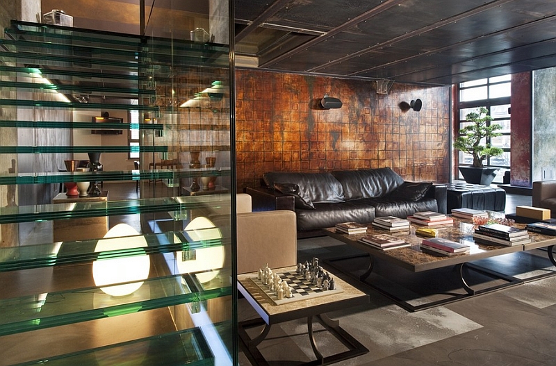 Industrial living room with a cool glass stairway