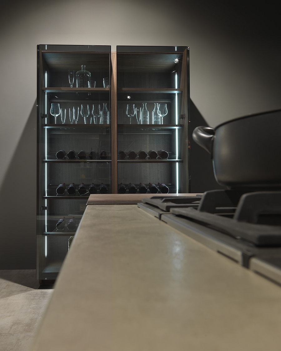 Large shelf with glass doors in the kitchen doubles as a display