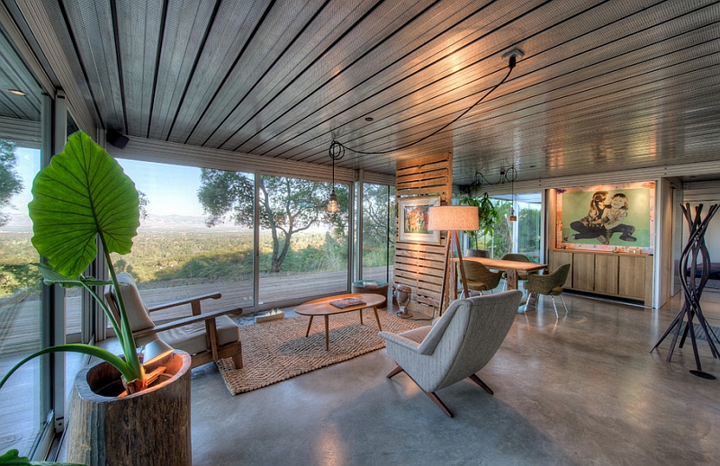 Living room with an oversized floor lamp and sliding glass doors