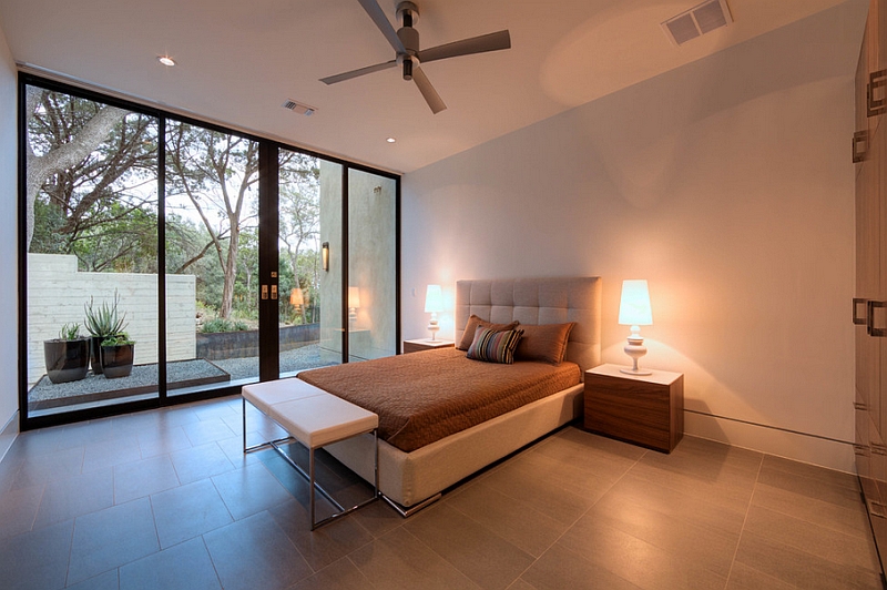 Minimal bedroom exudes inviting, warm hues