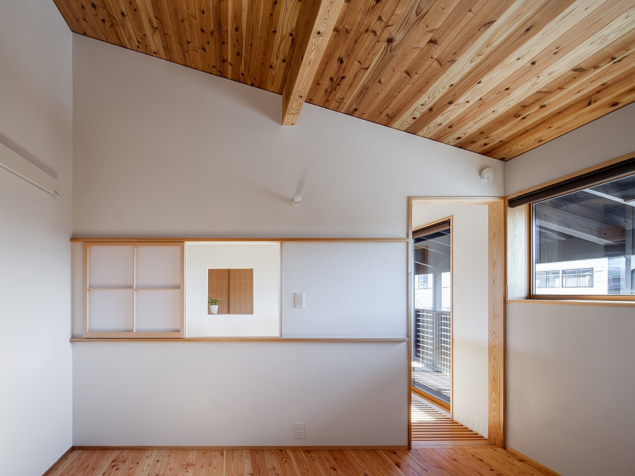 Minimal interiors in white with wooden floors