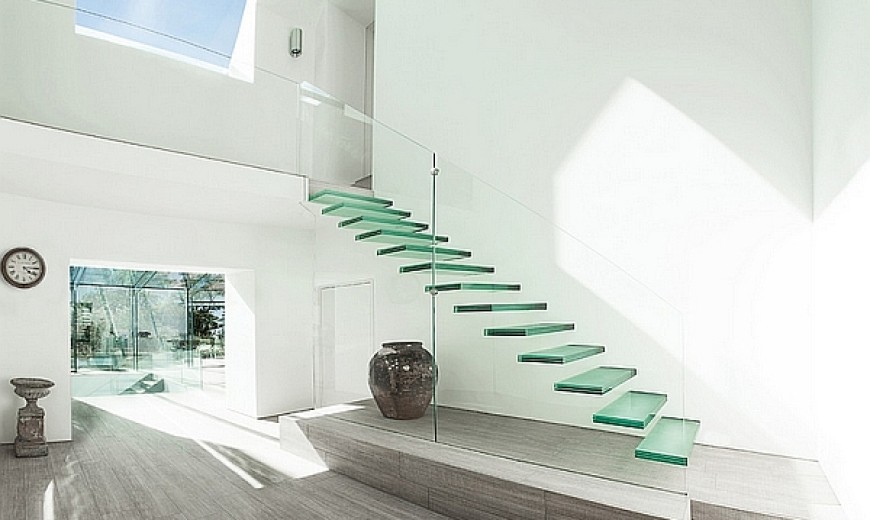 Enthralling Glass Staircases That Add Sculptural Style To Your Home