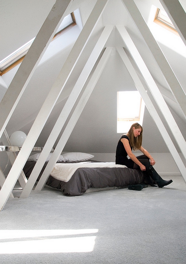 Minimalist attic bedroom with skylights