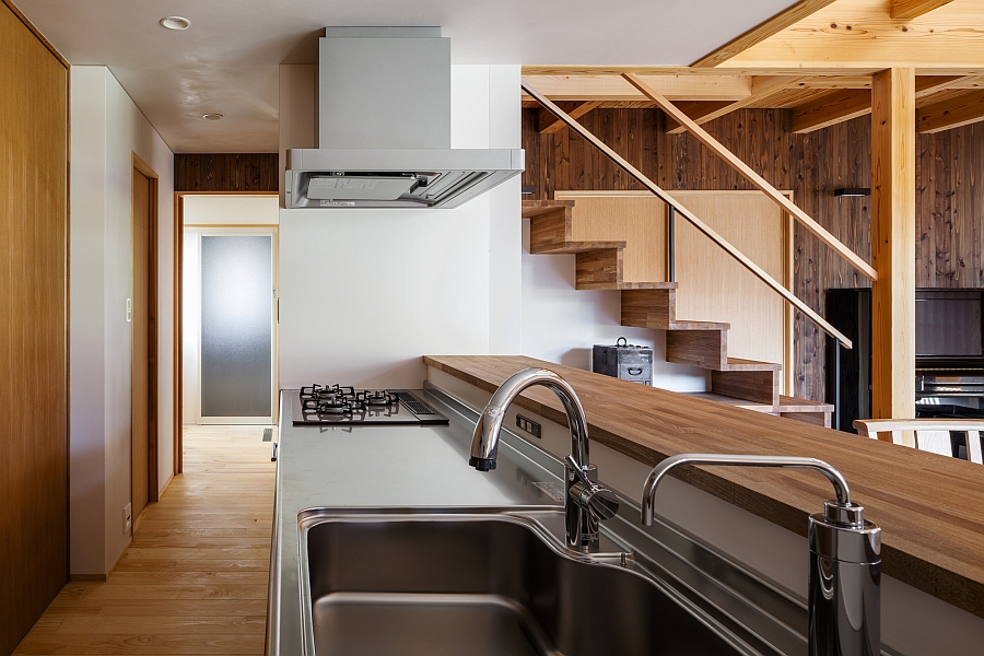 Modern kitchen with a wooden serving area