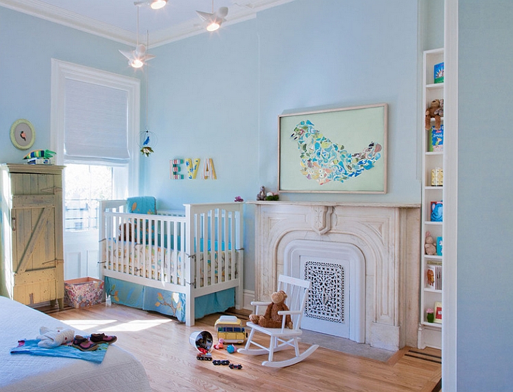 Nursery in blue with bird-themed wall art