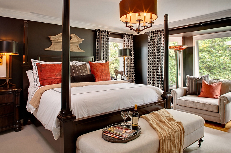 Orange accents for the black and white bedroom