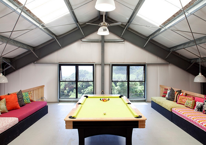 Restrained use of color in the stylish attic game room